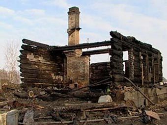 Дом, где были обнаружены тела убитых, фото с сайта Иркутской государственной телекомпании