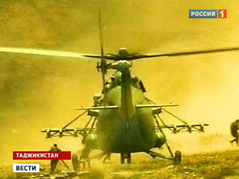 Военный вертолет в Раштском районе. Кадр телеканала "Россия 1"
