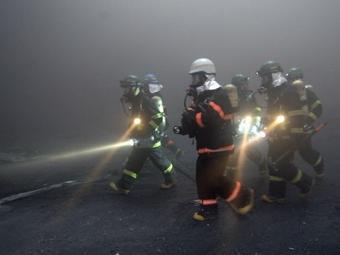 Южнокорейские пожарные. Архивное фото ©AFP