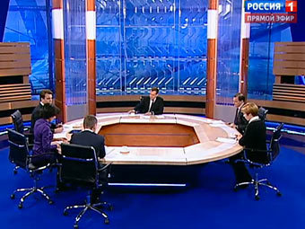 Кадр трансляции встречи на телеканале "Россия 1"